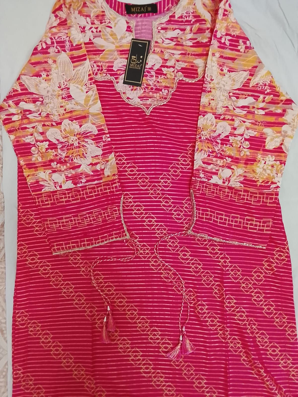 " MIZAJ" Women's Lawn kurti- Pink Floral and Gold print, with Tassel .
